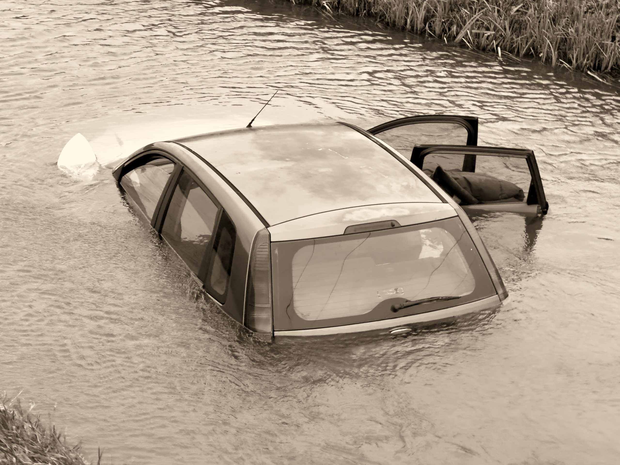 Car sinking in river