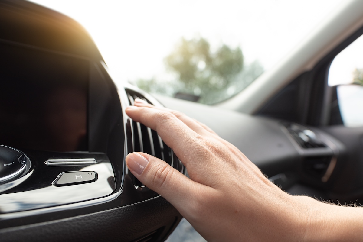 why is my car ac blowing warm