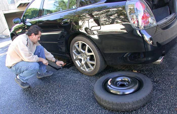 Car Jack with Tire Fix 1 | Toyota of Orlando in Orlando FL