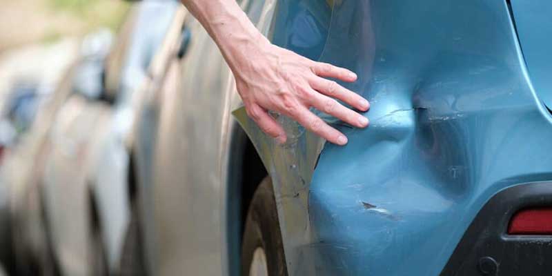 how to get a dent out of a car bumper